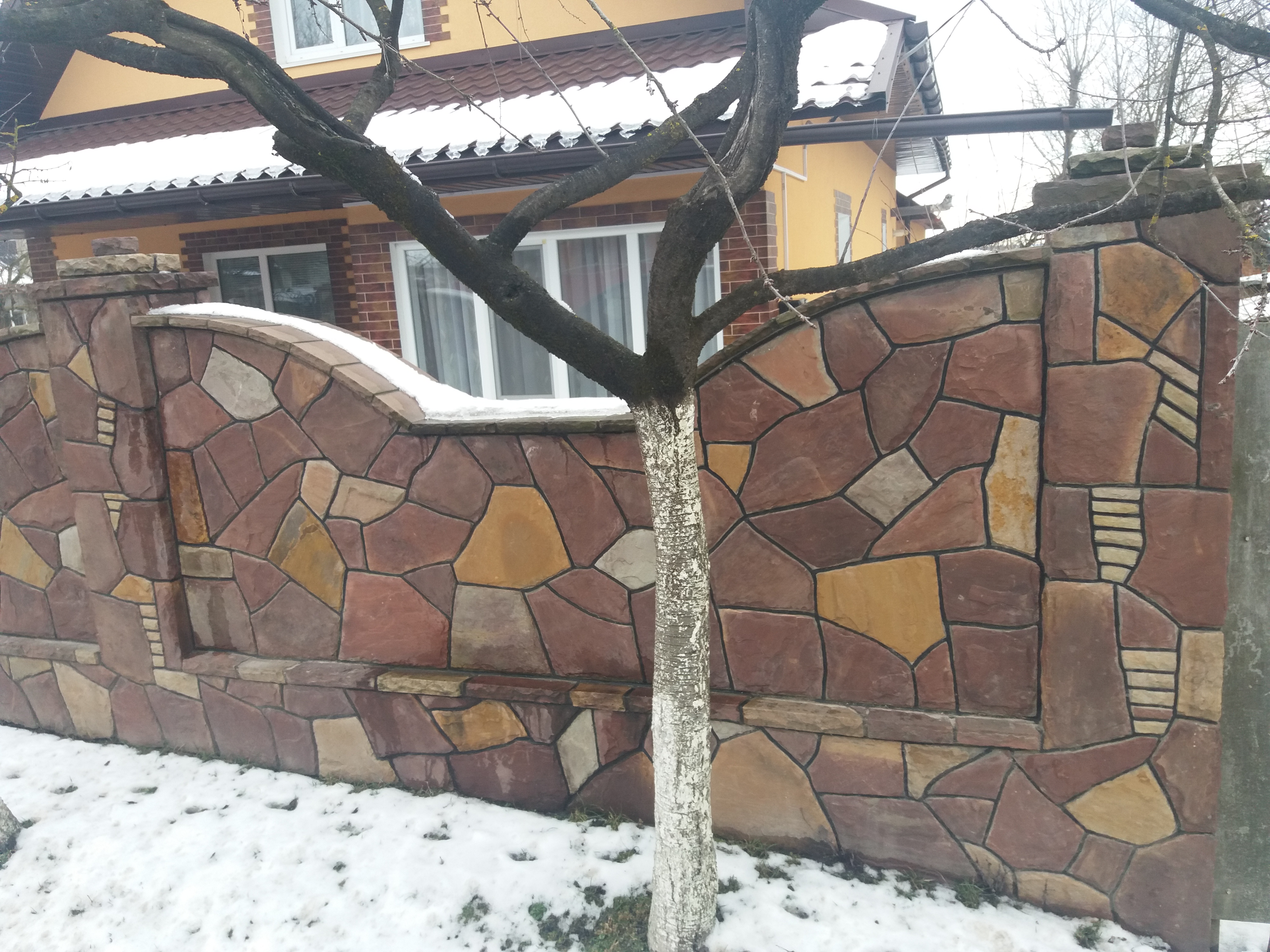 Паркан з натурального каменю