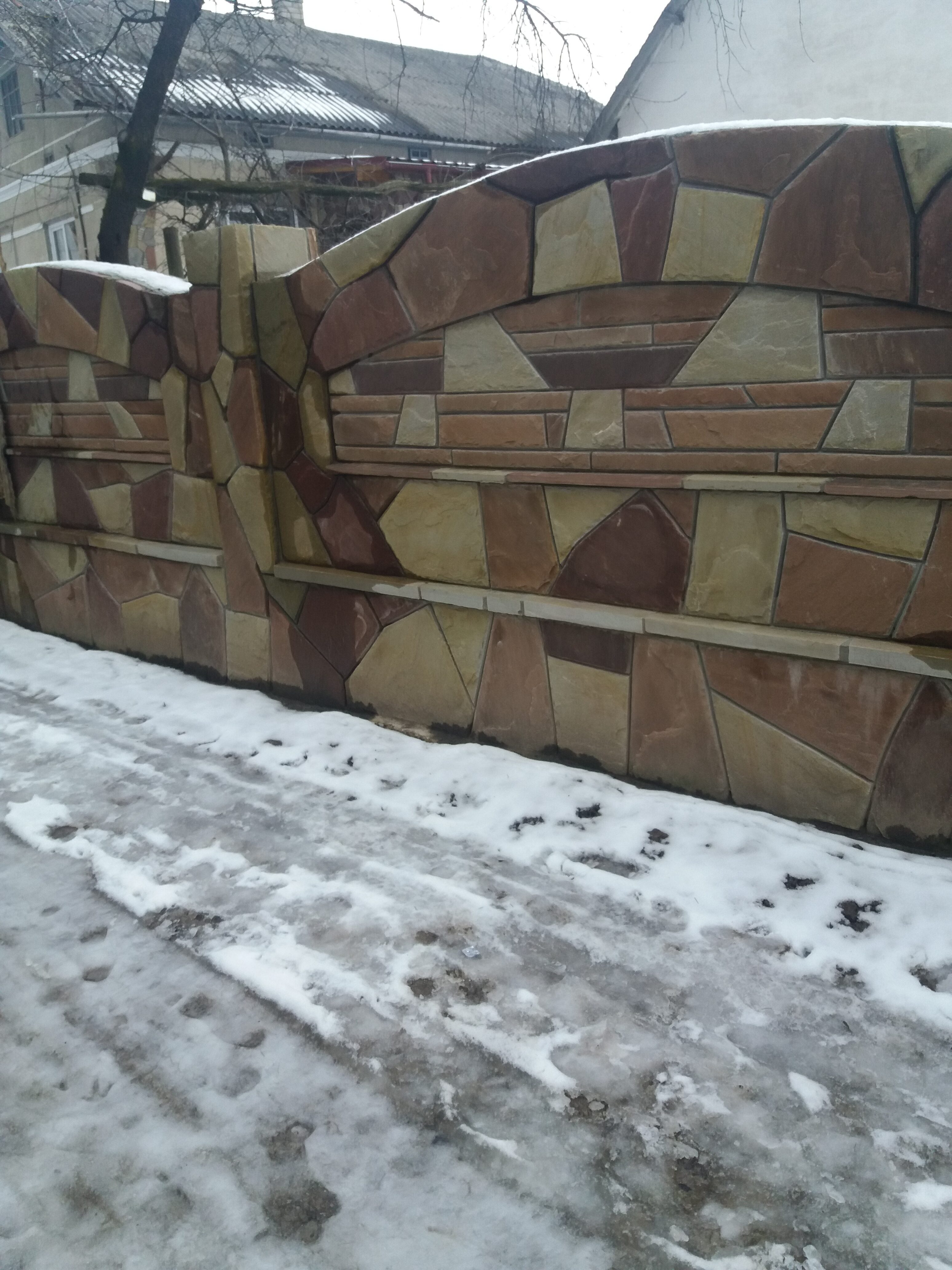 Паркан з натурального каменю